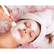 $39 for a Spa Package - Enjoy A Hot Stone or Swedish Massage and A Signature Facial with Chocolates ($130 Value)